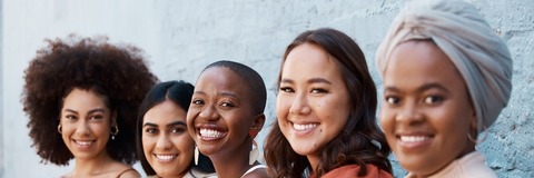 A group of women sitting down