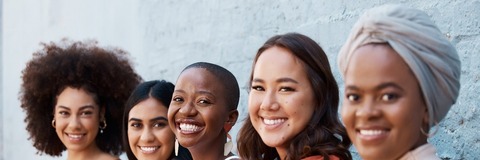 A group of women sitting down
